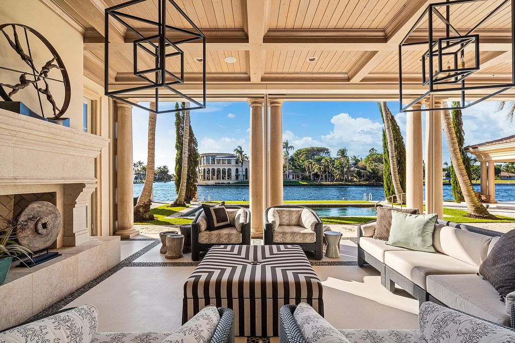 Crafted by Frankel Estate Homes, designed by Carlos Martin Architects, and styled by Marc-Michaels, this 6-bedroom, 10-bathroom mansion showcases an elegant staircase, grand salon, modern kitchen, and a lavish primary suite with waterfront vistas.