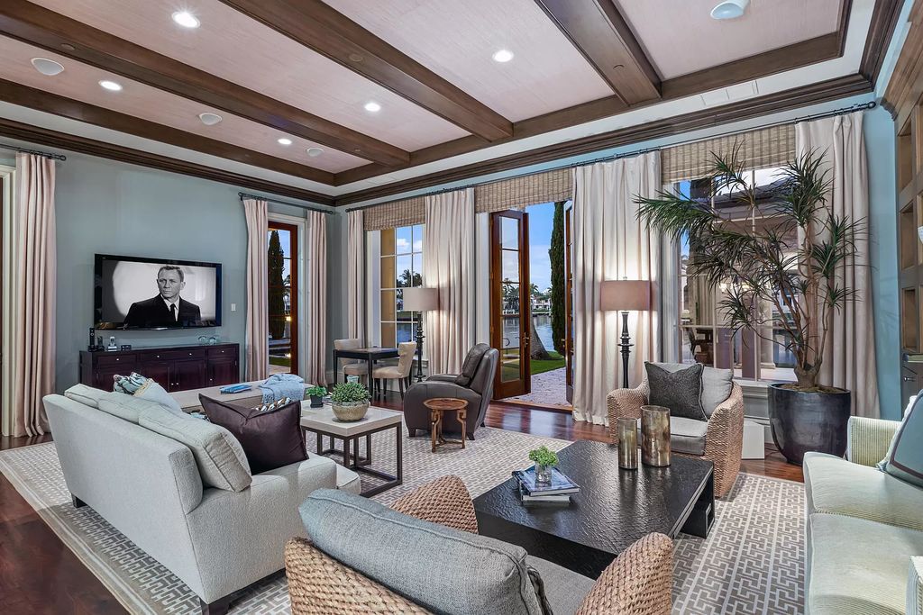 Crafted by Frankel Estate Homes, designed by Carlos Martin Architects, and styled by Marc-Michaels, this 6-bedroom, 10-bathroom mansion showcases an elegant staircase, grand salon, modern kitchen, and a lavish primary suite with waterfront vistas.
