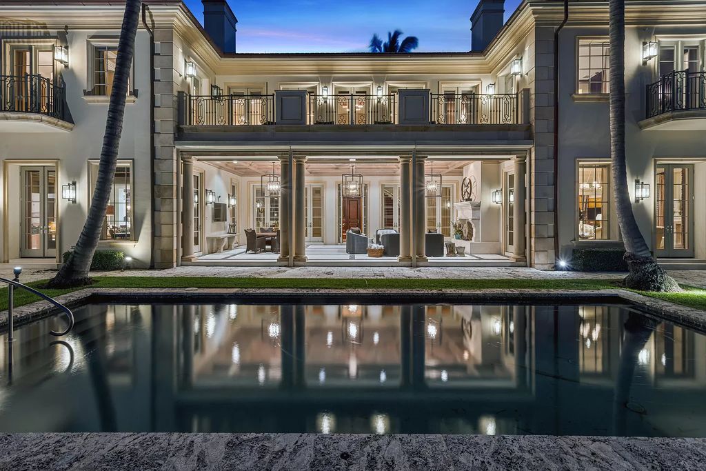 Crafted by Frankel Estate Homes, designed by Carlos Martin Architects, and styled by Marc-Michaels, this 6-bedroom, 10-bathroom mansion showcases an elegant staircase, grand salon, modern kitchen, and a lavish primary suite with waterfront vistas.