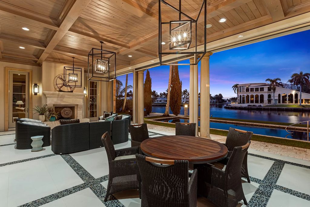 Crafted by Frankel Estate Homes, designed by Carlos Martin Architects, and styled by Marc-Michaels, this 6-bedroom, 10-bathroom mansion showcases an elegant staircase, grand salon, modern kitchen, and a lavish primary suite with waterfront vistas.