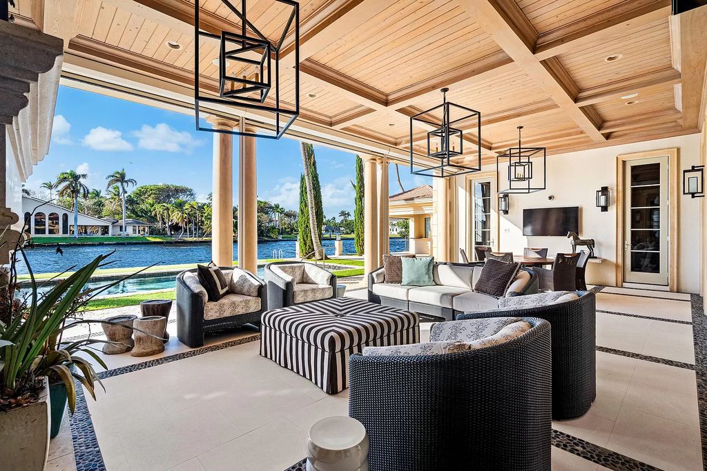 Crafted by Frankel Estate Homes, designed by Carlos Martin Architects, and styled by Marc-Michaels, this 6-bedroom, 10-bathroom mansion showcases an elegant staircase, grand salon, modern kitchen, and a lavish primary suite with waterfront vistas.
