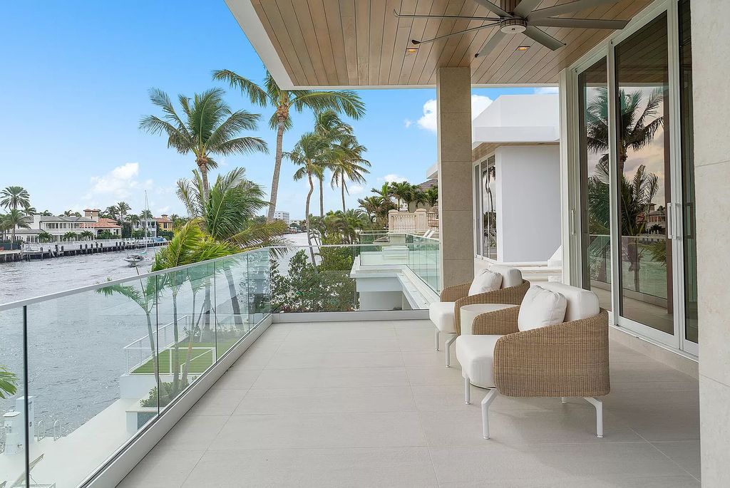 This waterfront haven boasts 6 beds, 9 baths (7 full, 2 half), and a spacious 8,921 square feet living space. Positioned on a premier Intracoastal lot, the property provides stunning water views, a private dock, and 104' of waterfrontage.