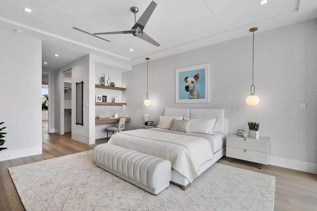This waterfront haven boasts 6 beds, 9 baths (7 full, 2 half), and a spacious 8,921 square feet living space. Positioned on a premier Intracoastal lot, the property provides stunning water views, a private dock, and 104' of waterfrontage.