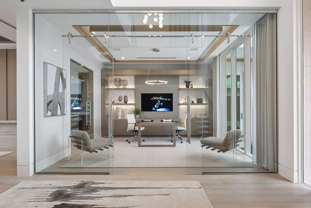 This waterfront haven boasts 6 beds, 9 baths (7 full, 2 half), and a spacious 8,921 square feet living space. Positioned on a premier Intracoastal lot, the property provides stunning water views, a private dock, and 104' of waterfrontage.
