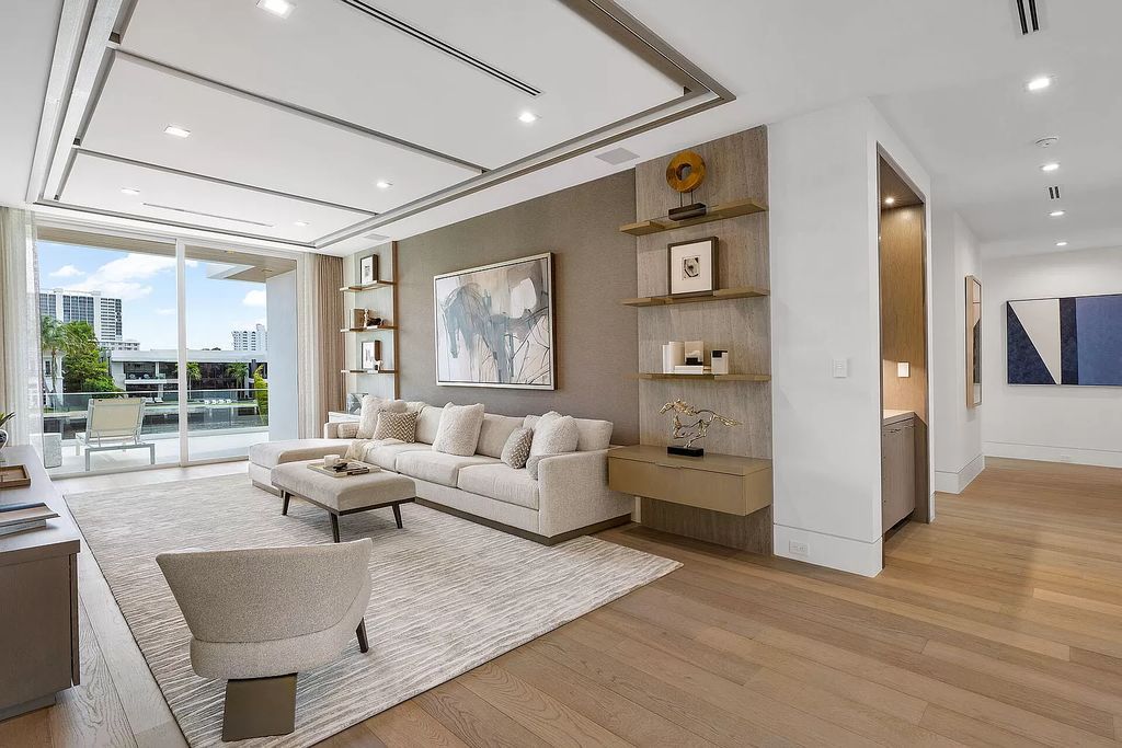 This waterfront haven boasts 6 beds, 9 baths (7 full, 2 half), and a spacious 8,921 square feet living space. Positioned on a premier Intracoastal lot, the property provides stunning water views, a private dock, and 104' of waterfrontage.
