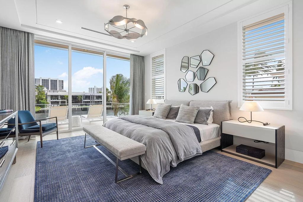This waterfront haven boasts 6 beds, 9 baths (7 full, 2 half), and a spacious 8,921 square feet living space. Positioned on a premier Intracoastal lot, the property provides stunning water views, a private dock, and 104' of waterfrontage.
