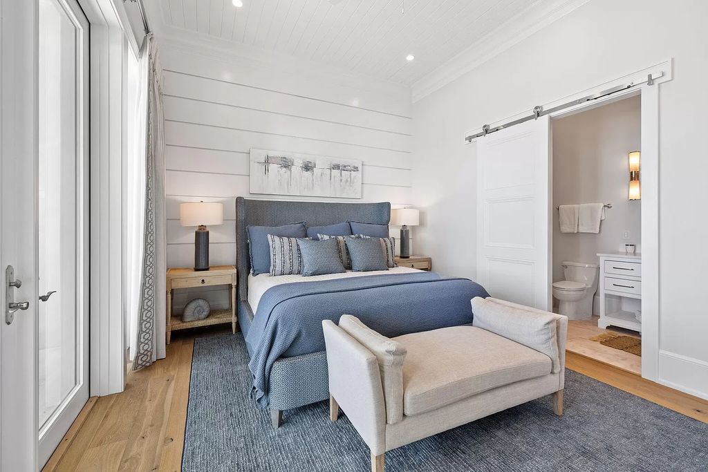Nestled along the sought-after 30A coastline, this exceptional property, crafted by renowned architect Matt Savois, boasts 8 bedrooms, 9 bathrooms, and spans 6,994 square feet, showcasing exquisite craftsmanship and timeless sophistication.