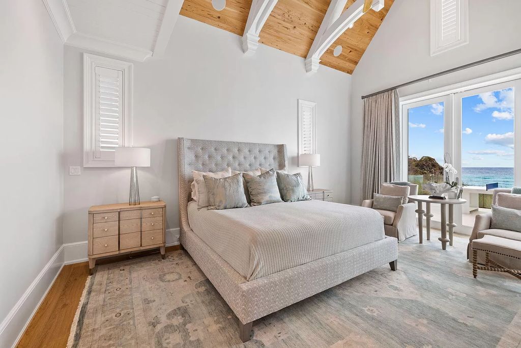 Nestled along the sought-after 30A coastline, this exceptional property, crafted by renowned architect Matt Savois, boasts 8 bedrooms, 9 bathrooms, and spans 6,994 square feet, showcasing exquisite craftsmanship and timeless sophistication.