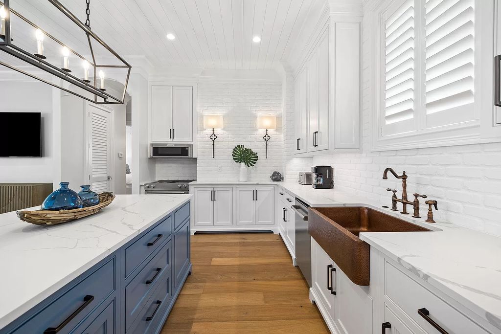Nestled along the sought-after 30A coastline, this exceptional property, crafted by renowned architect Matt Savois, boasts 8 bedrooms, 9 bathrooms, and spans 6,994 square feet, showcasing exquisite craftsmanship and timeless sophistication.