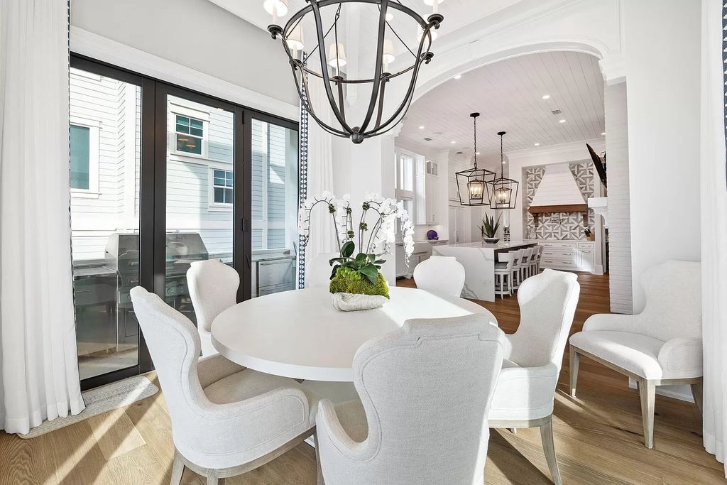 Nestled along the sought-after 30A coastline, this exceptional property, crafted by renowned architect Matt Savois, boasts 8 bedrooms, 9 bathrooms, and spans 6,994 square feet, showcasing exquisite craftsmanship and timeless sophistication.