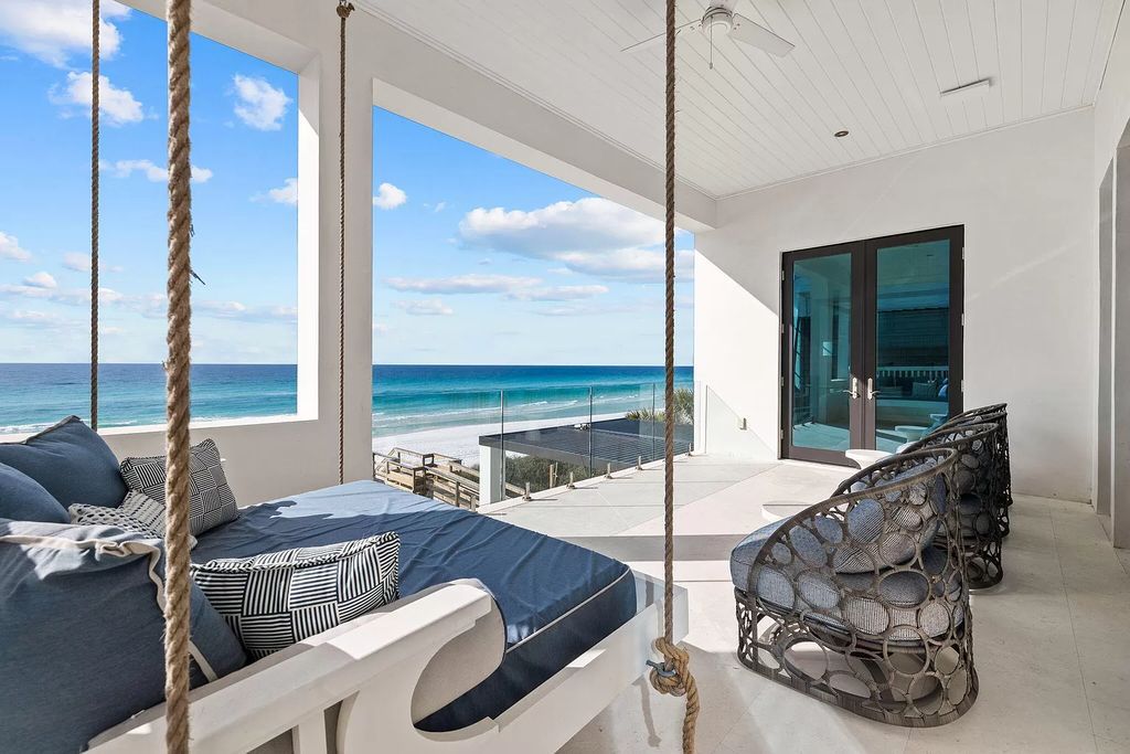 Nestled along the sought-after 30A coastline, this exceptional property, crafted by renowned architect Matt Savois, boasts 8 bedrooms, 9 bathrooms, and spans 6,994 square feet, showcasing exquisite craftsmanship and timeless sophistication.