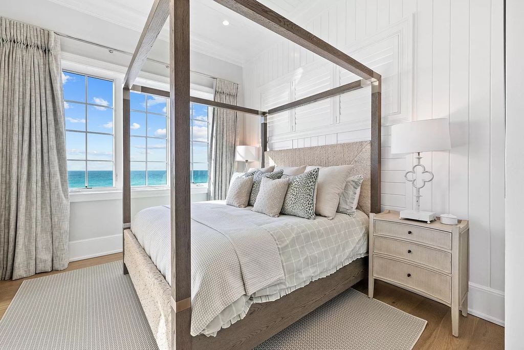 Nestled along the sought-after 30A coastline, this exceptional property, crafted by renowned architect Matt Savois, boasts 8 bedrooms, 9 bathrooms, and spans 6,994 square feet, showcasing exquisite craftsmanship and timeless sophistication.