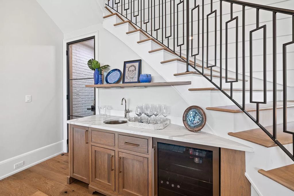 Nestled along the sought-after 30A coastline, this exceptional property, crafted by renowned architect Matt Savois, boasts 8 bedrooms, 9 bathrooms, and spans 6,994 square feet, showcasing exquisite craftsmanship and timeless sophistication.