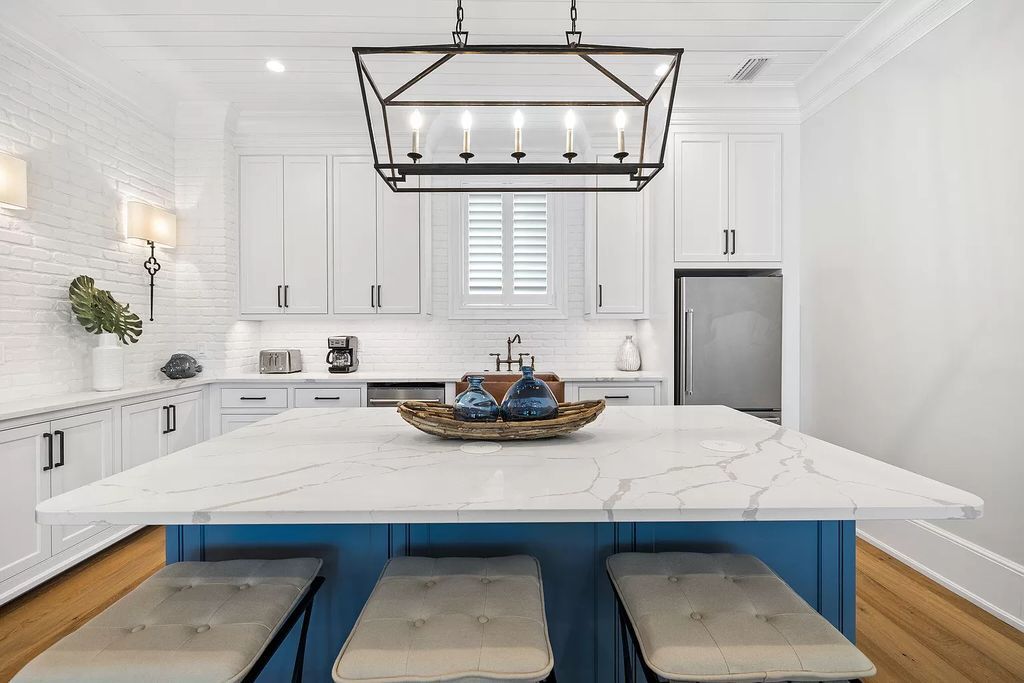Nestled along the sought-after 30A coastline, this exceptional property, crafted by renowned architect Matt Savois, boasts 8 bedrooms, 9 bathrooms, and spans 6,994 square feet, showcasing exquisite craftsmanship and timeless sophistication.