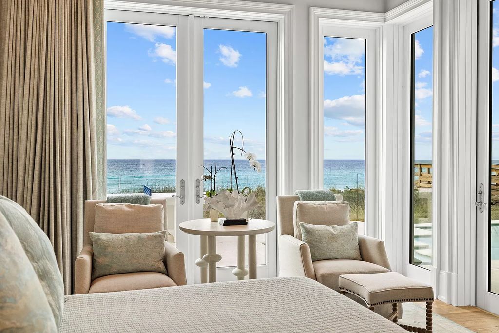 Nestled along the sought-after 30A coastline, this exceptional property, crafted by renowned architect Matt Savois, boasts 8 bedrooms, 9 bathrooms, and spans 6,994 square feet, showcasing exquisite craftsmanship and timeless sophistication.