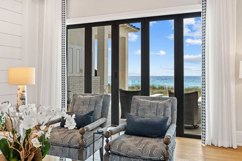 Nestled along the sought-after 30A coastline, this exceptional property, crafted by renowned architect Matt Savois, boasts 8 bedrooms, 9 bathrooms, and spans 6,994 square feet, showcasing exquisite craftsmanship and timeless sophistication.