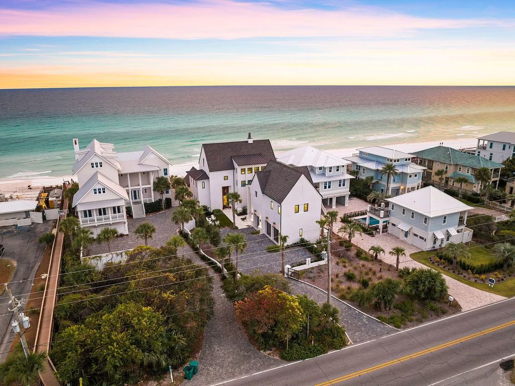 Nestled along the sought-after 30A coastline, this exceptional property, crafted by renowned architect Matt Savois, boasts 8 bedrooms, 9 bathrooms, and spans 6,994 square feet, showcasing exquisite craftsmanship and timeless sophistication.