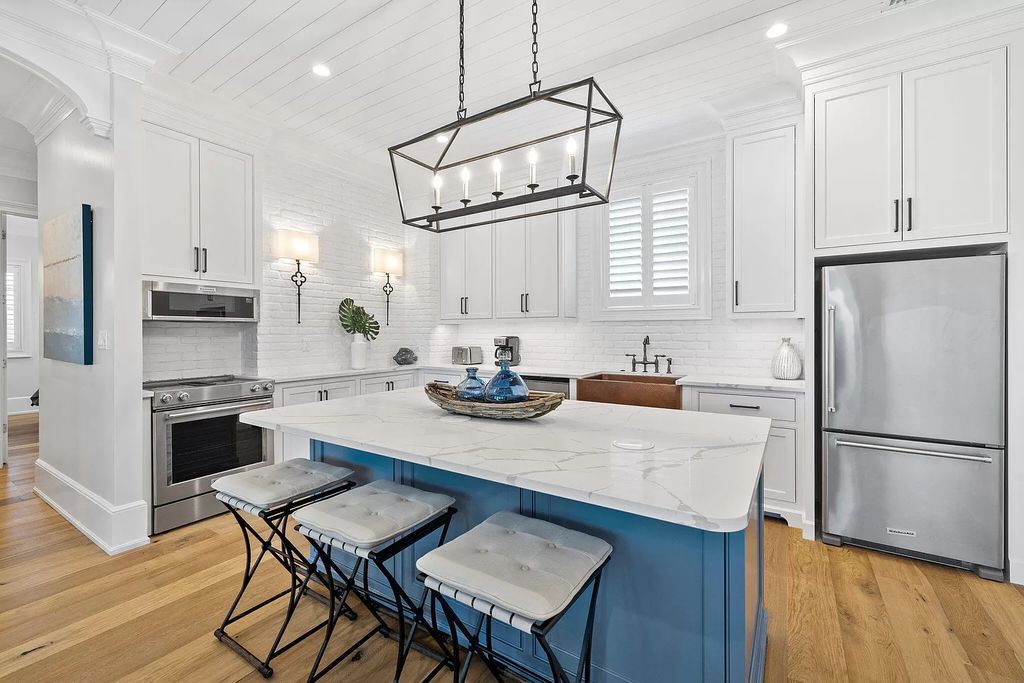 Nestled along the sought-after 30A coastline, this exceptional property, crafted by renowned architect Matt Savois, boasts 8 bedrooms, 9 bathrooms, and spans 6,994 square feet, showcasing exquisite craftsmanship and timeless sophistication.