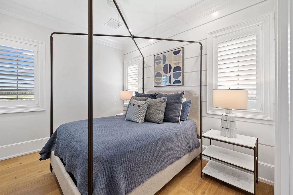 Nestled along the sought-after 30A coastline, this exceptional property, crafted by renowned architect Matt Savois, boasts 8 bedrooms, 9 bathrooms, and spans 6,994 square feet, showcasing exquisite craftsmanship and timeless sophistication.