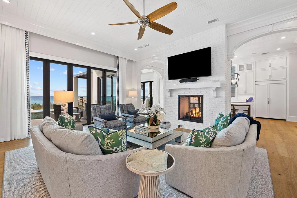 Nestled along the sought-after 30A coastline, this exceptional property, crafted by renowned architect Matt Savois, boasts 8 bedrooms, 9 bathrooms, and spans 6,994 square feet, showcasing exquisite craftsmanship and timeless sophistication.