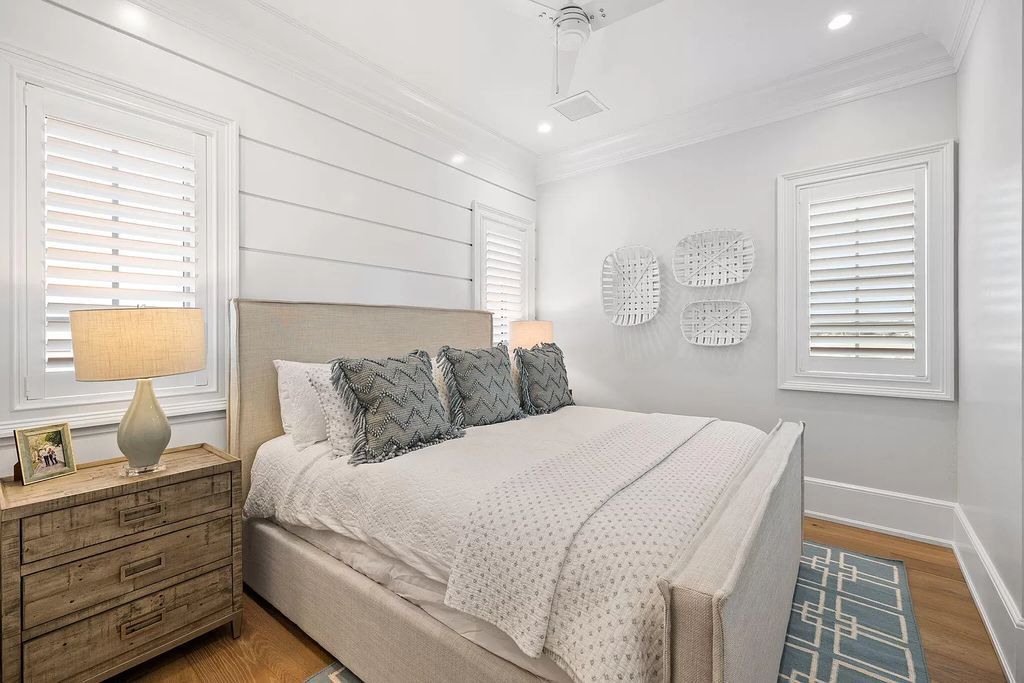 Nestled along the sought-after 30A coastline, this exceptional property, crafted by renowned architect Matt Savois, boasts 8 bedrooms, 9 bathrooms, and spans 6,994 square feet, showcasing exquisite craftsmanship and timeless sophistication.