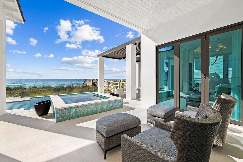 Nestled along the sought-after 30A coastline, this exceptional property, crafted by renowned architect Matt Savois, boasts 8 bedrooms, 9 bathrooms, and spans 6,994 square feet, showcasing exquisite craftsmanship and timeless sophistication.