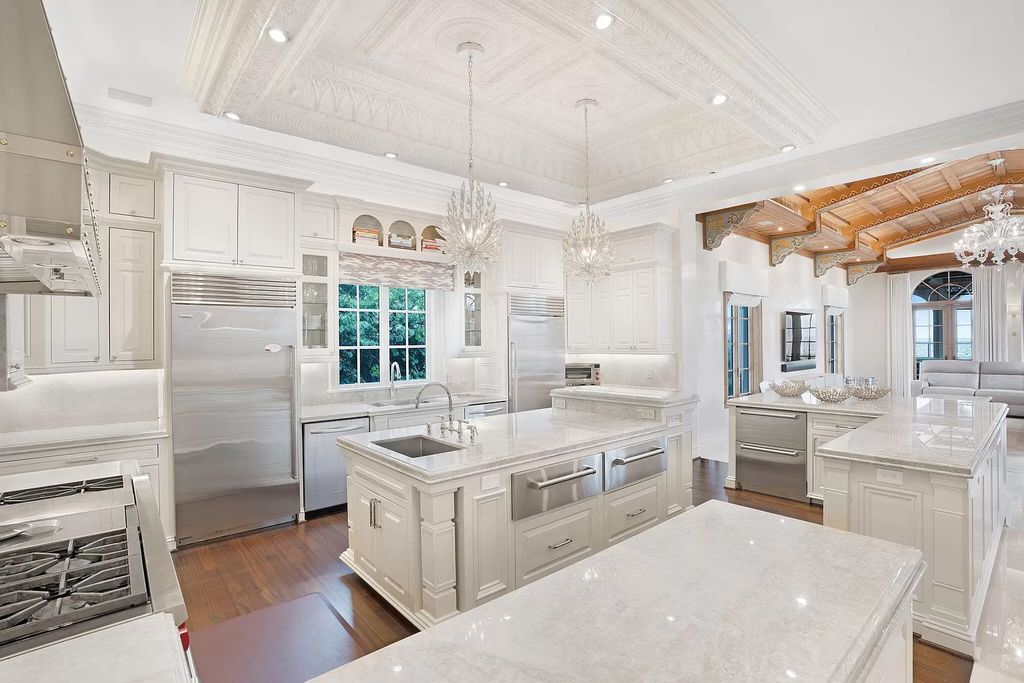 Built in 2010, this 1.61-acre estate features 150 feet +/- of both Ocean and Intracoastal frontage. With 9 bedrooms, 14 bathrooms, and 13,349 square feet of meticulously designed living space, this residence is a masterpiece of sophistication.