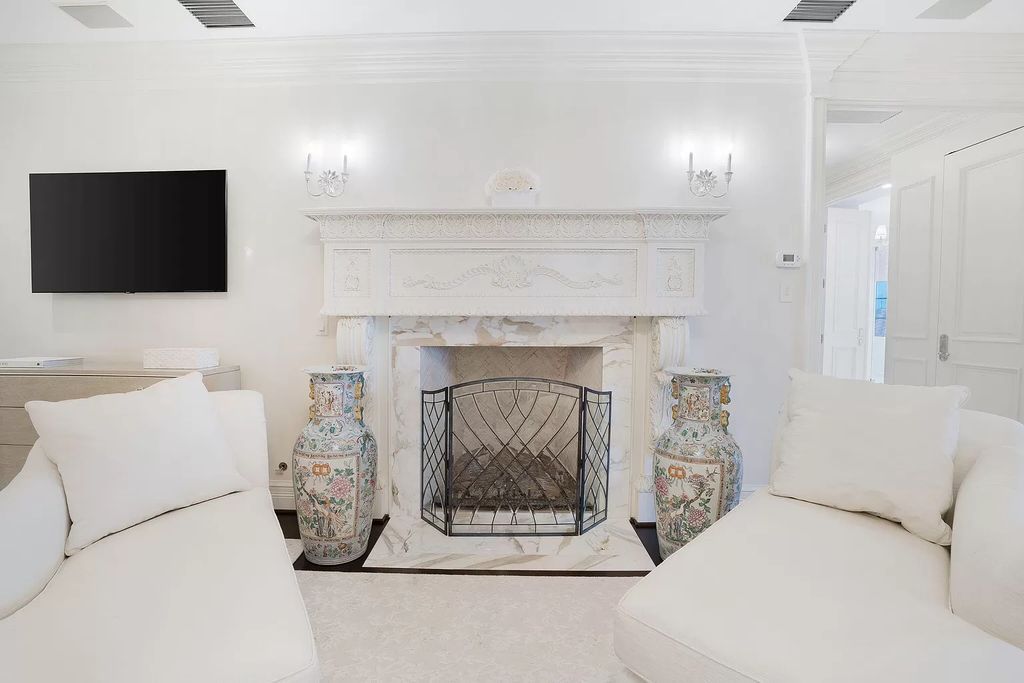 Built in 2010, this 1.61-acre estate features 150 feet +/- of both Ocean and Intracoastal frontage. With 9 bedrooms, 14 bathrooms, and 13,349 square feet of meticulously designed living space, this residence is a masterpiece of sophistication.