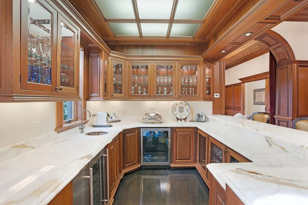 Built in 2010, this 1.61-acre estate features 150 feet +/- of both Ocean and Intracoastal frontage. With 9 bedrooms, 14 bathrooms, and 13,349 square feet of meticulously designed living space, this residence is a masterpiece of sophistication.