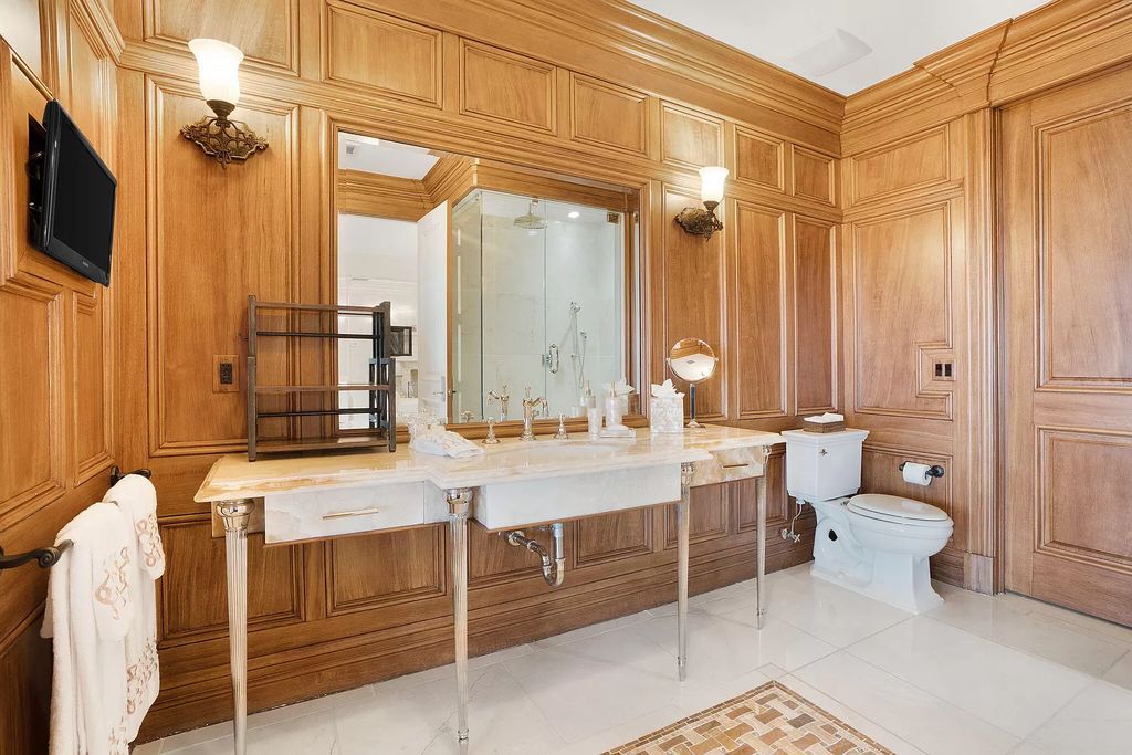 Built in 2010, this 1.61-acre estate features 150 feet +/- of both Ocean and Intracoastal frontage. With 9 bedrooms, 14 bathrooms, and 13,349 square feet of meticulously designed living space, this residence is a masterpiece of sophistication.