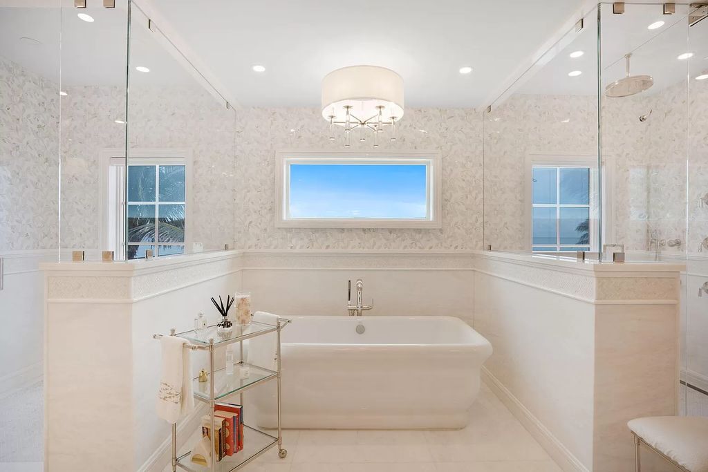 Built in 2010, this 1.61-acre estate features 150 feet +/- of both Ocean and Intracoastal frontage. With 9 bedrooms, 14 bathrooms, and 13,349 square feet of meticulously designed living space, this residence is a masterpiece of sophistication.