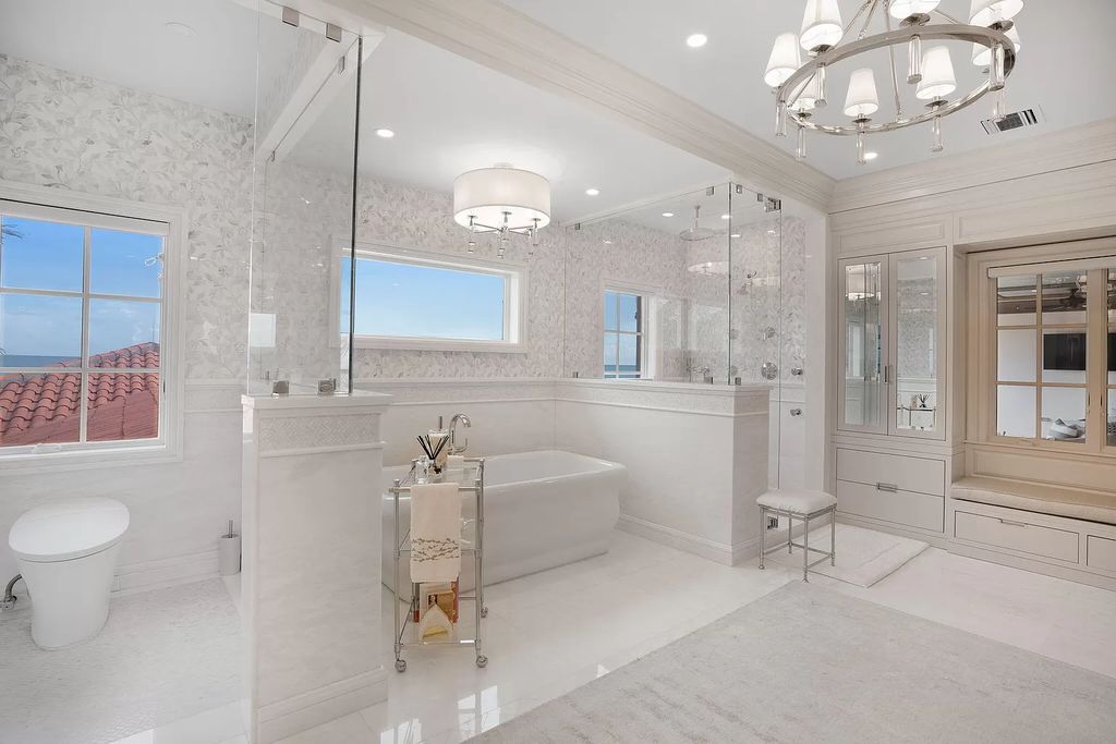 Built in 2010, this 1.61-acre estate features 150 feet +/- of both Ocean and Intracoastal frontage. With 9 bedrooms, 14 bathrooms, and 13,349 square feet of meticulously designed living space, this residence is a masterpiece of sophistication.