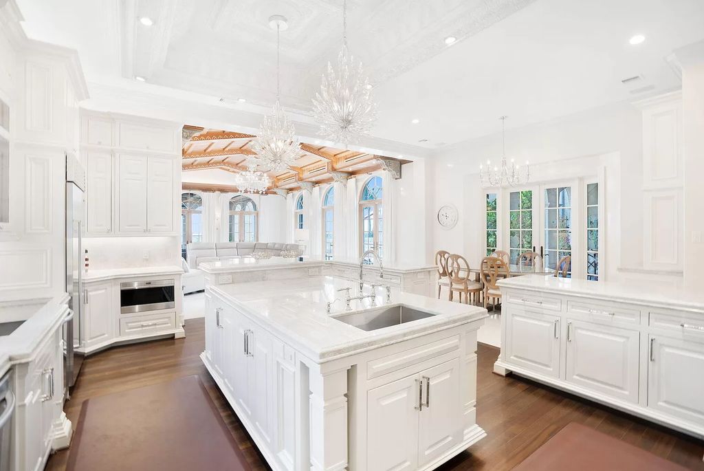 Built in 2010, this 1.61-acre estate features 150 feet +/- of both Ocean and Intracoastal frontage. With 9 bedrooms, 14 bathrooms, and 13,349 square feet of meticulously designed living space, this residence is a masterpiece of sophistication.
