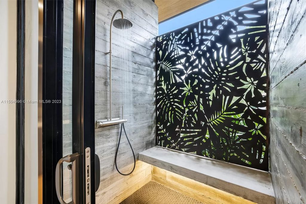 Discover the epitome of tropical luxury living at the Sir Crawford residence in Miami, perfectly situated near top schools and Grove amenities.