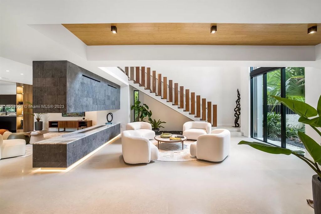 Discover the epitome of tropical luxury living at the Sir Crawford residence in Miami, perfectly situated near top schools and Grove amenities.