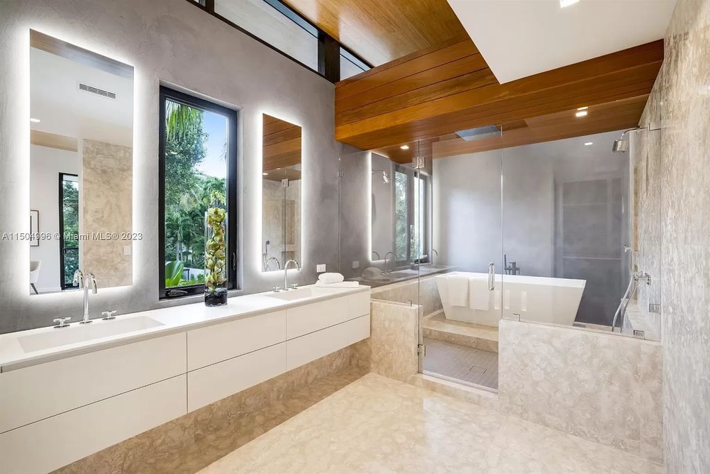 Discover the epitome of tropical luxury living at the Sir Crawford residence in Miami, perfectly situated near top schools and Grove amenities.