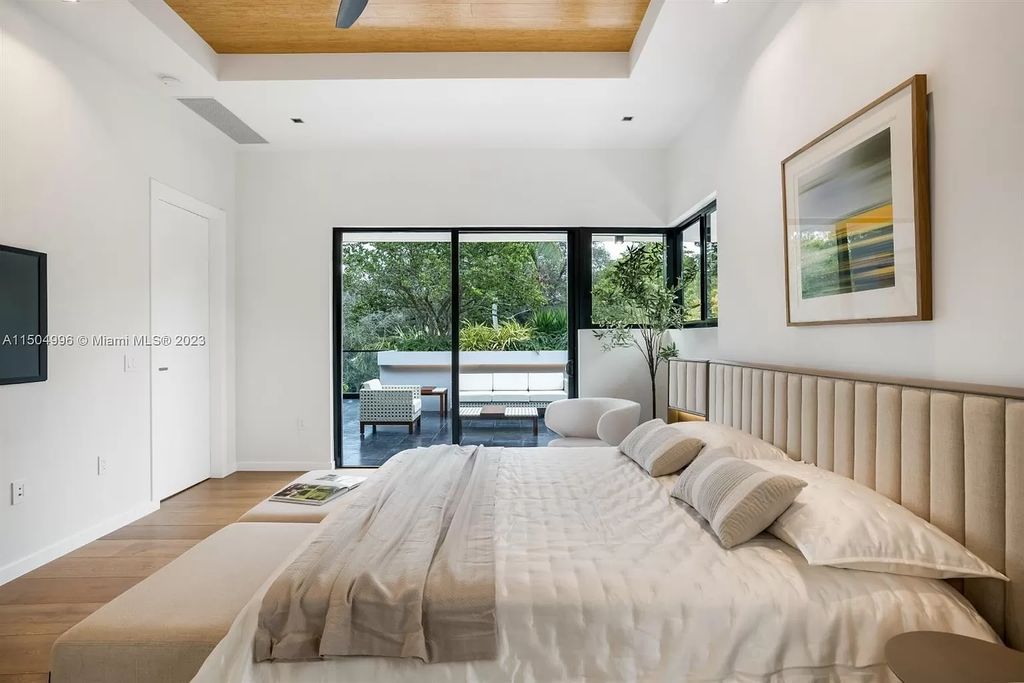 Discover the epitome of tropical luxury living at the Sir Crawford residence in Miami, perfectly situated near top schools and Grove amenities.