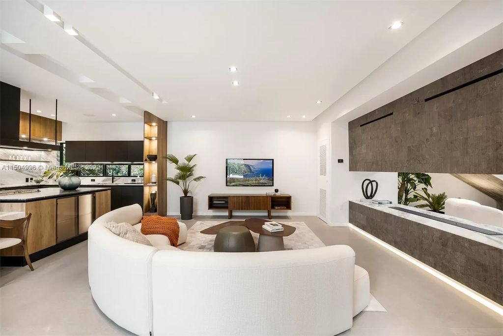 Discover the epitome of tropical luxury living at the Sir Crawford residence in Miami, perfectly situated near top schools and Grove amenities.