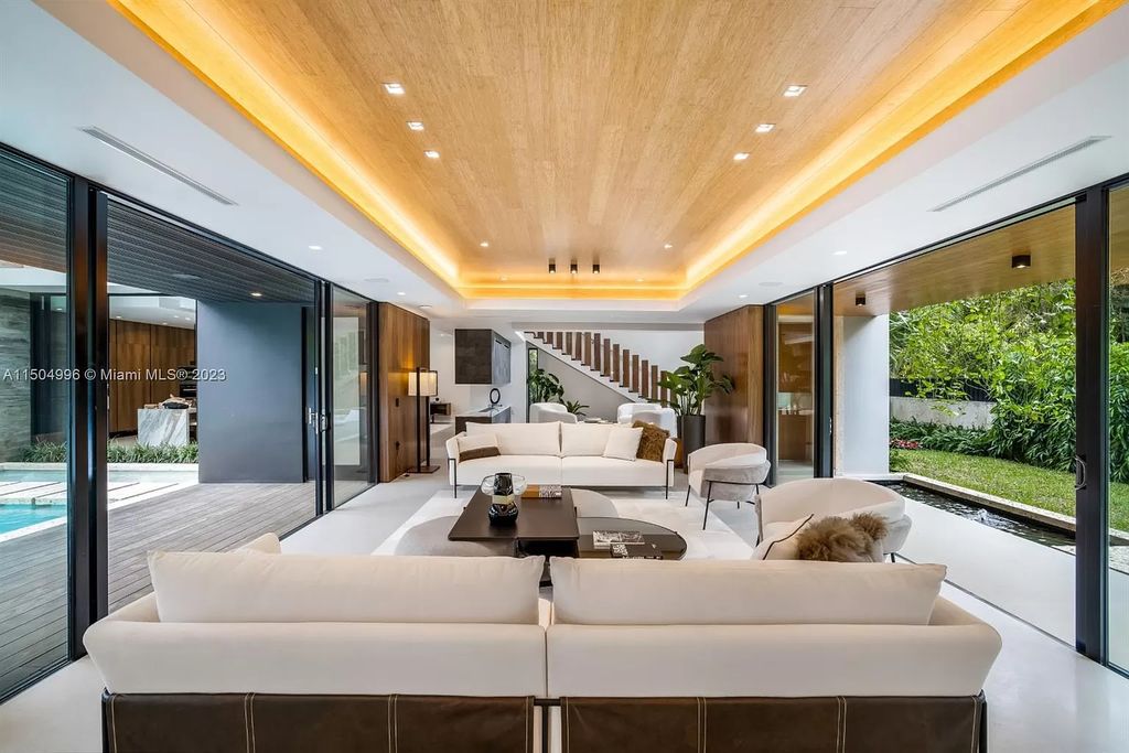 Discover the epitome of tropical luxury living at the Sir Crawford residence in Miami, perfectly situated near top schools and Grove amenities.