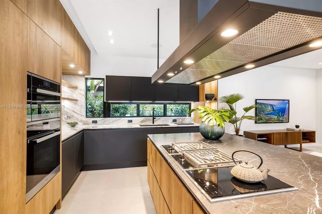 Discover the epitome of tropical luxury living at the Sir Crawford residence in Miami, perfectly situated near top schools and Grove amenities.