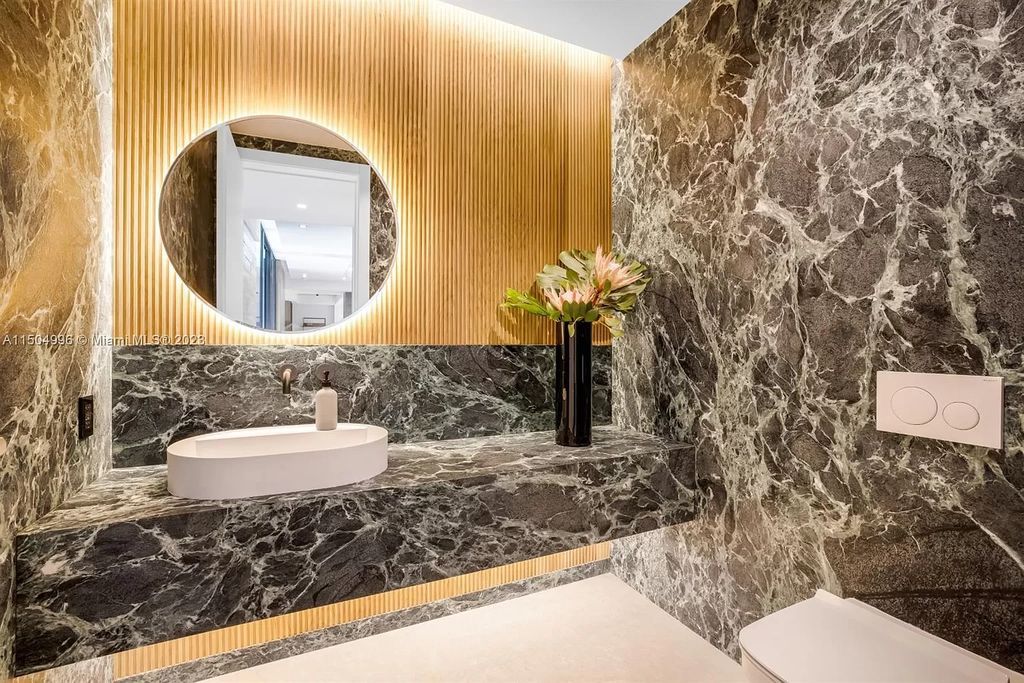 Discover the epitome of tropical luxury living at the Sir Crawford residence in Miami, perfectly situated near top schools and Grove amenities.