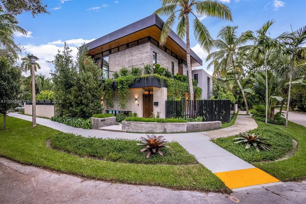 Discover the epitome of tropical luxury living at the Sir Crawford residence in Miami, perfectly situated near top schools and Grove amenities.