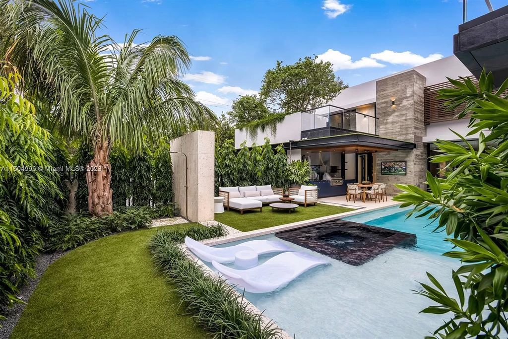 Discover the epitome of tropical luxury living at the Sir Crawford residence in Miami, perfectly situated near top schools and Grove amenities.