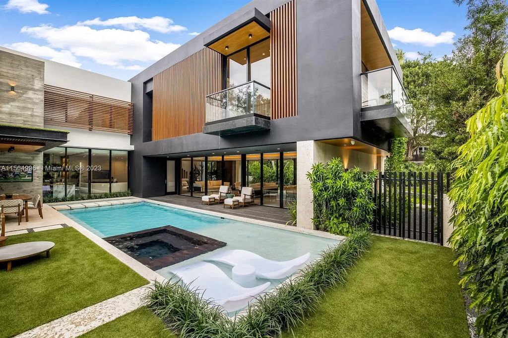 Discover the epitome of tropical luxury living at the Sir Crawford residence in Miami, perfectly situated near top schools and Grove amenities.
