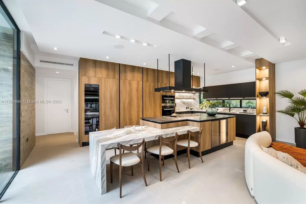 Discover the epitome of tropical luxury living at the Sir Crawford residence in Miami, perfectly situated near top schools and Grove amenities.