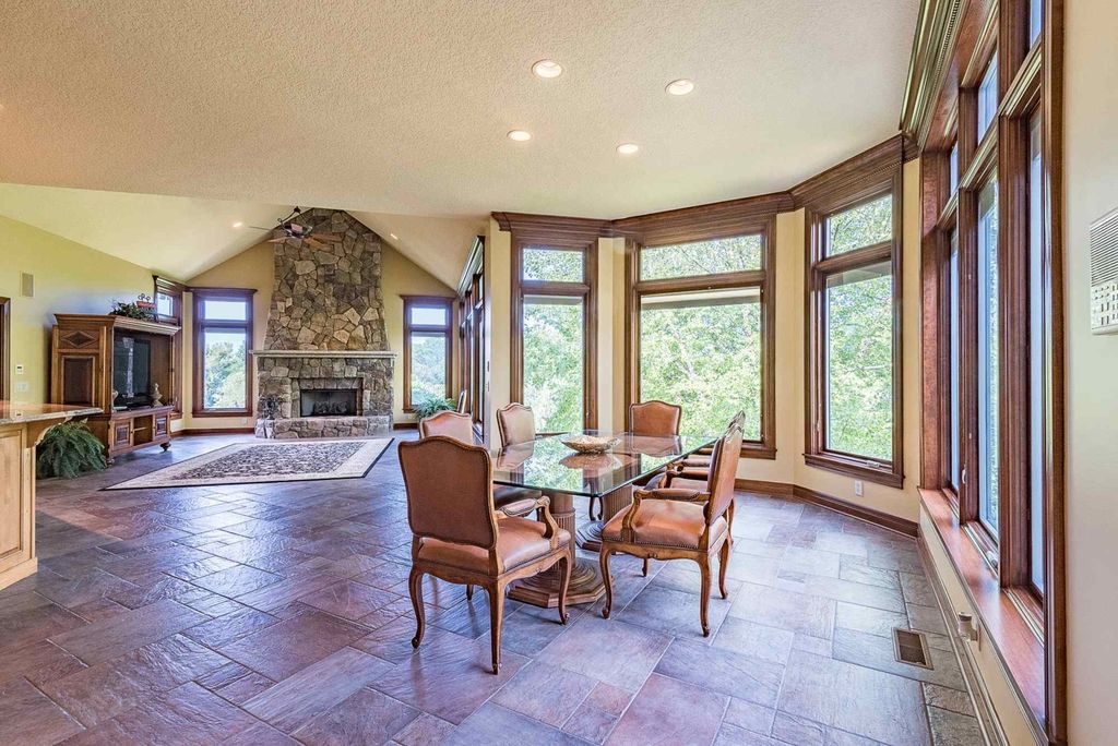 15718 Viberg Road Home in Leo, Indiana. Explore this elegant estate nestled on 11 manicured acres in Leo, IN. With over 11,000 square feet of living space, Venetian plaster walls, hand-scraped wood floors, and custom features throughout, this home offers the ultimate retreat.