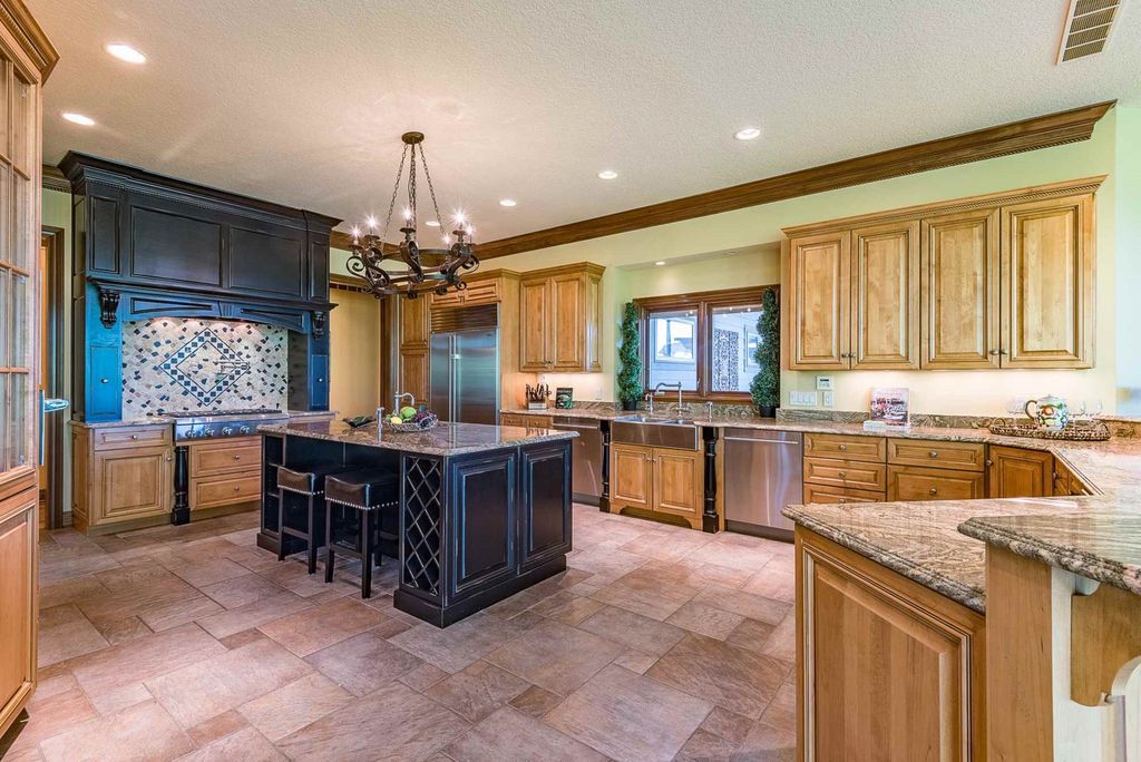 15718 Viberg Road Home in Leo, Indiana. Explore this elegant estate nestled on 11 manicured acres in Leo, IN. With over 11,000 square feet of living space, Venetian plaster walls, hand-scraped wood floors, and custom features throughout, this home offers the ultimate retreat.
