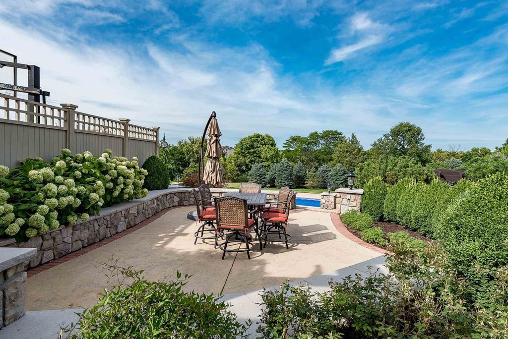 15718 Viberg Road Home in Leo, Indiana. Explore this elegant estate nestled on 11 manicured acres in Leo, IN. With over 11,000 square feet of living space, Venetian plaster walls, hand-scraped wood floors, and custom features throughout, this home offers the ultimate retreat.