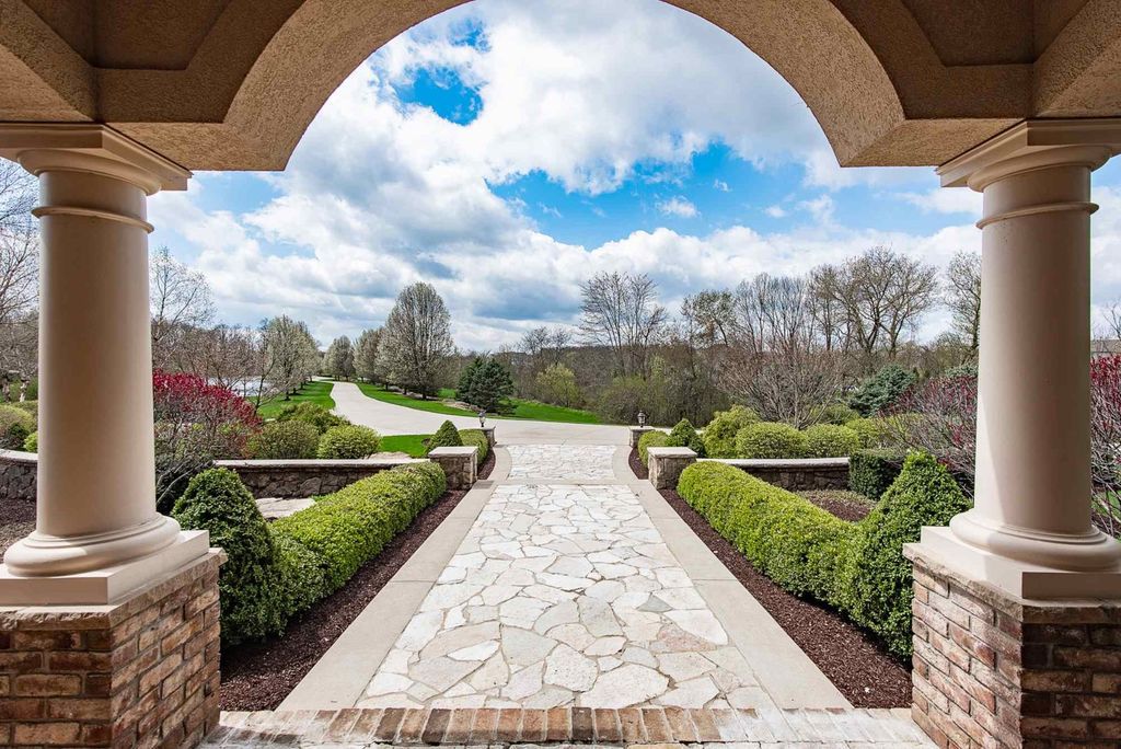 15718 Viberg Road Home in Leo, Indiana. Explore this elegant estate nestled on 11 manicured acres in Leo, IN. With over 11,000 square feet of living space, Venetian plaster walls, hand-scraped wood floors, and custom features throughout, this home offers the ultimate retreat.