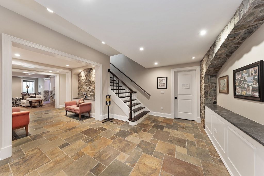 208 East 8th Street Home in Hinsdale, Illinois. Step into luxury living at this bespoke Southeast Hinsdale estate, boasting unparalleled refinement and world-class amenities. From the awe-inspiring exterior to the meticulously designed interiors, this property offers sophisticated elegance at every turn.
